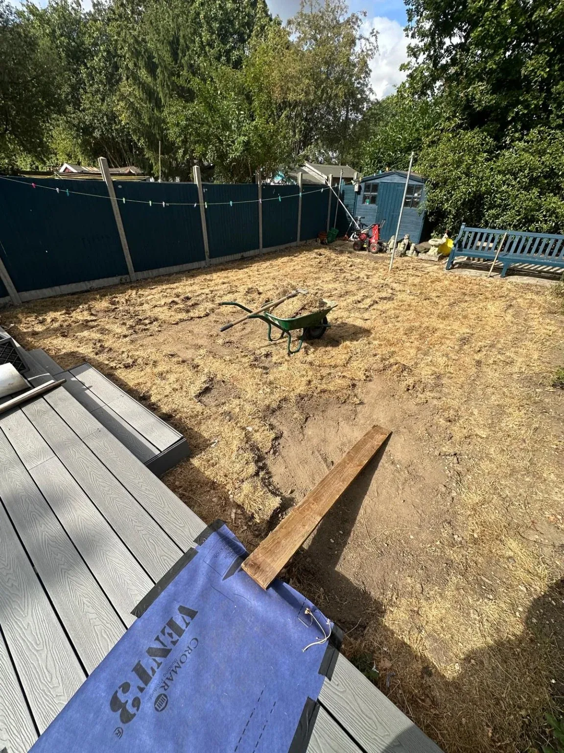 Garden beside existing decking before Saygrass fitted artificial grass